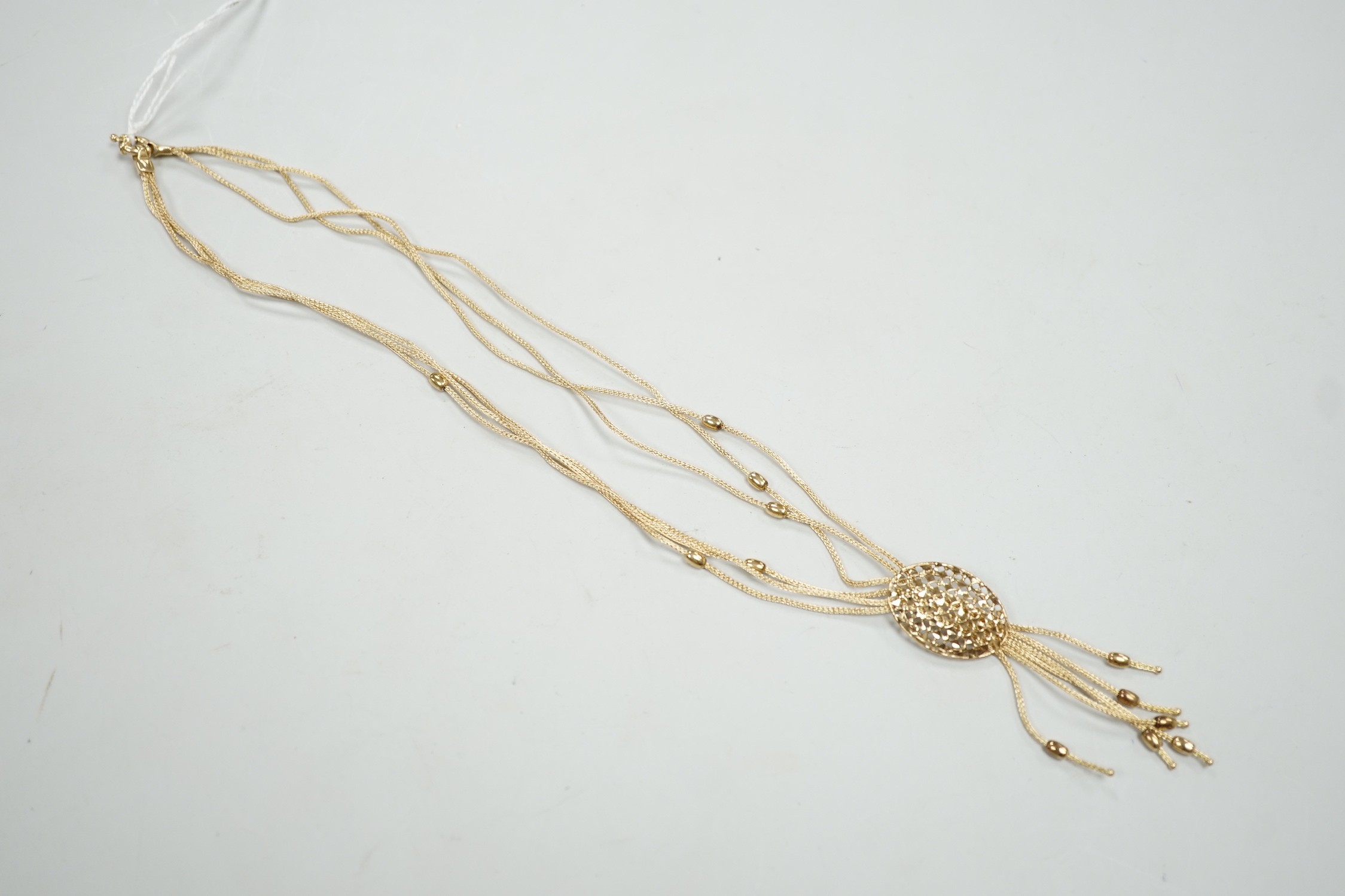 A modern Italian 375 yellow metal multi strand drop tassel necklace, approx. 49cm, 9.9 grams.